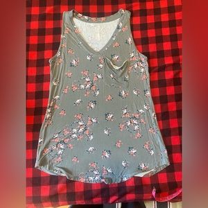 Maurice’s tank top.